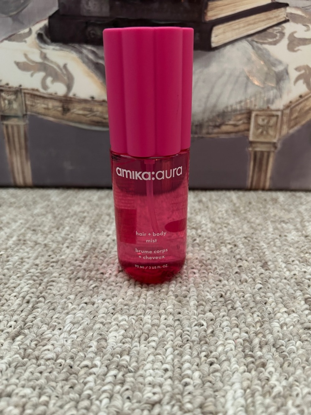 amika Aura Hair + Body Mist in Bright Pink Bottle